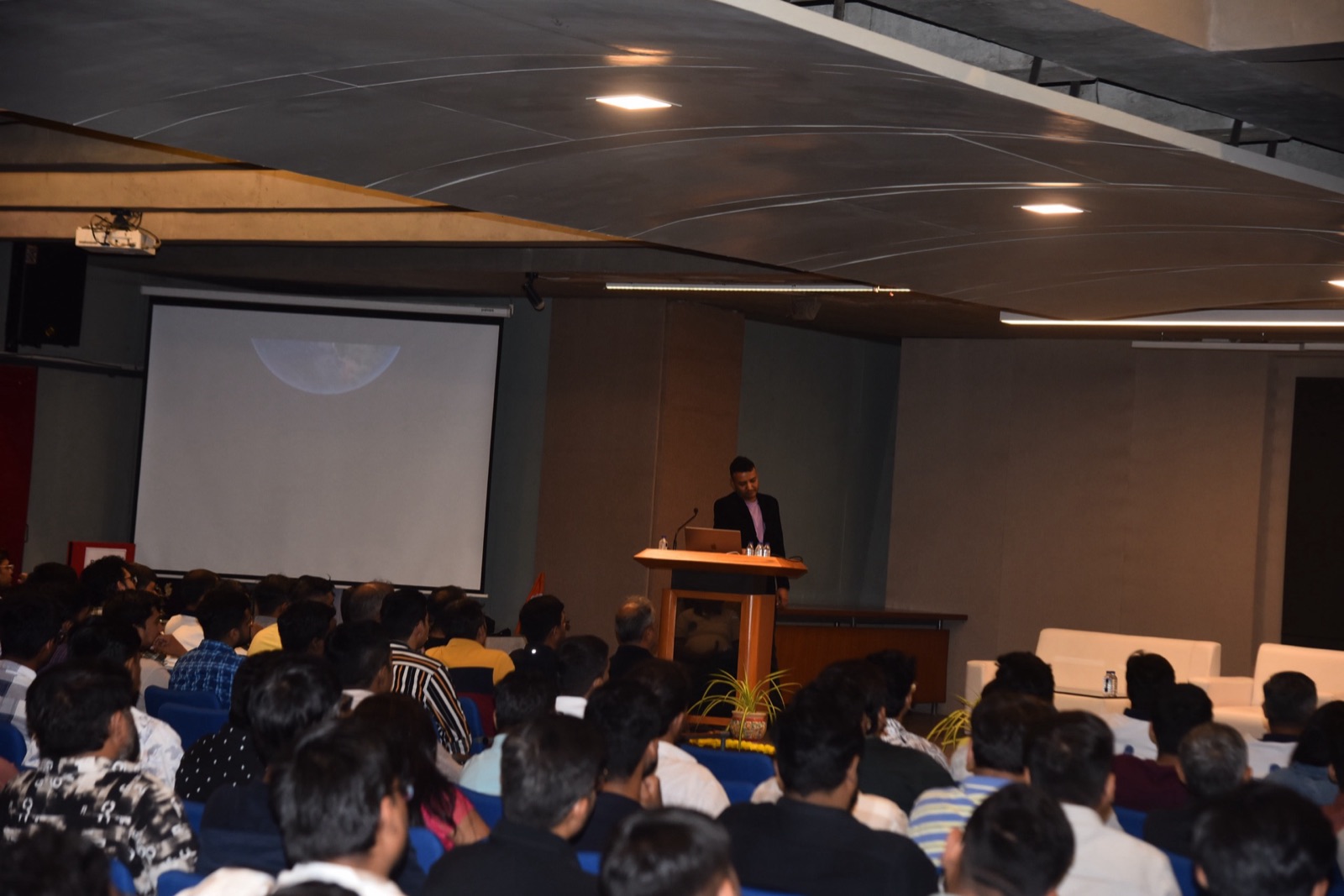 Jigar Joshi at the podium addressing a packed audience during 11th DOT NET DAY by MDCA Ahmedabad